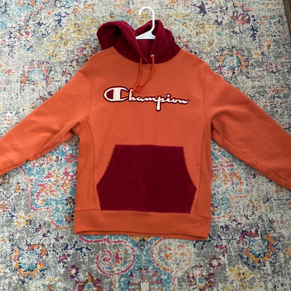 Orange size small sweatshirt with red velvet details